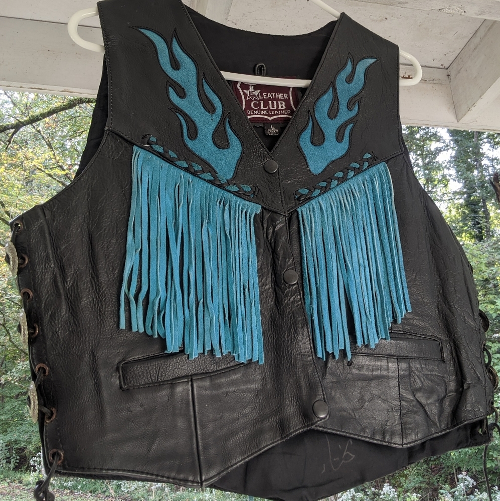 Leather vest with tassles